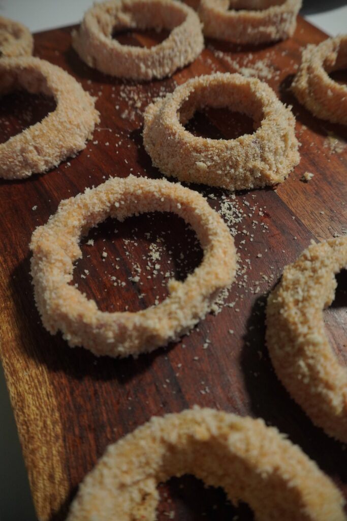 Coat the onion rings