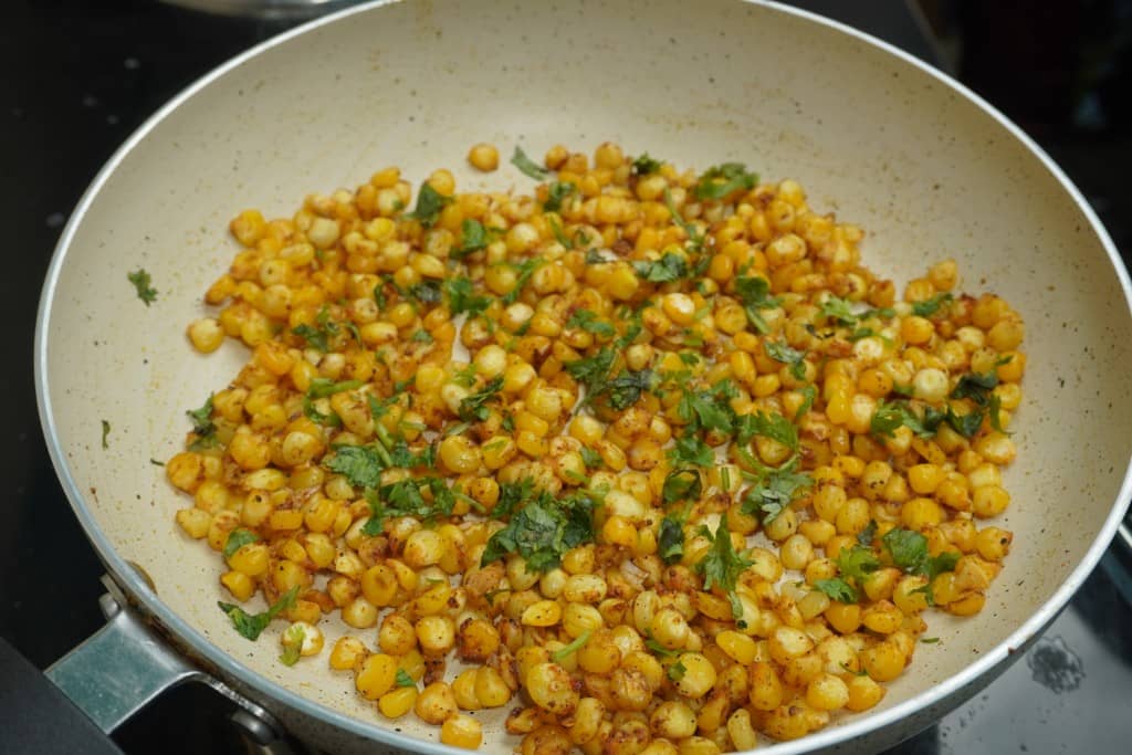 Garlic Butter Masala Corn cooking