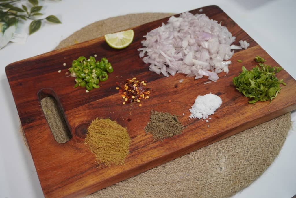 chopped veggy and ingredients for indian mashed potato spicy