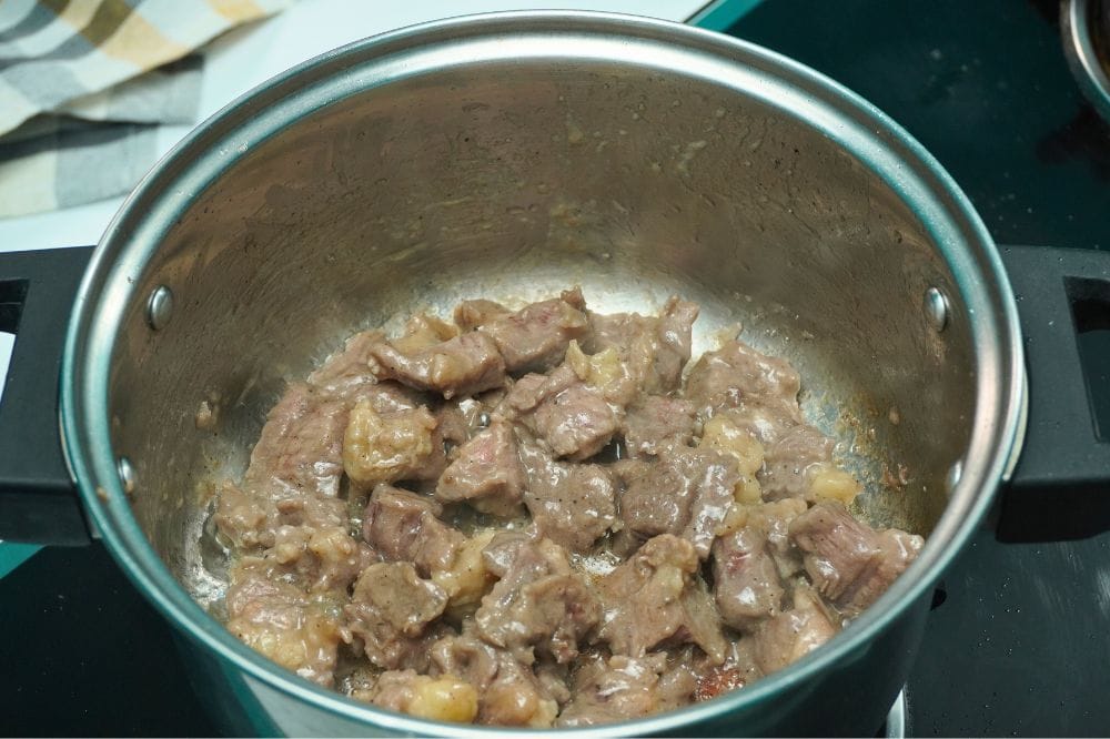 beef in cooking pot