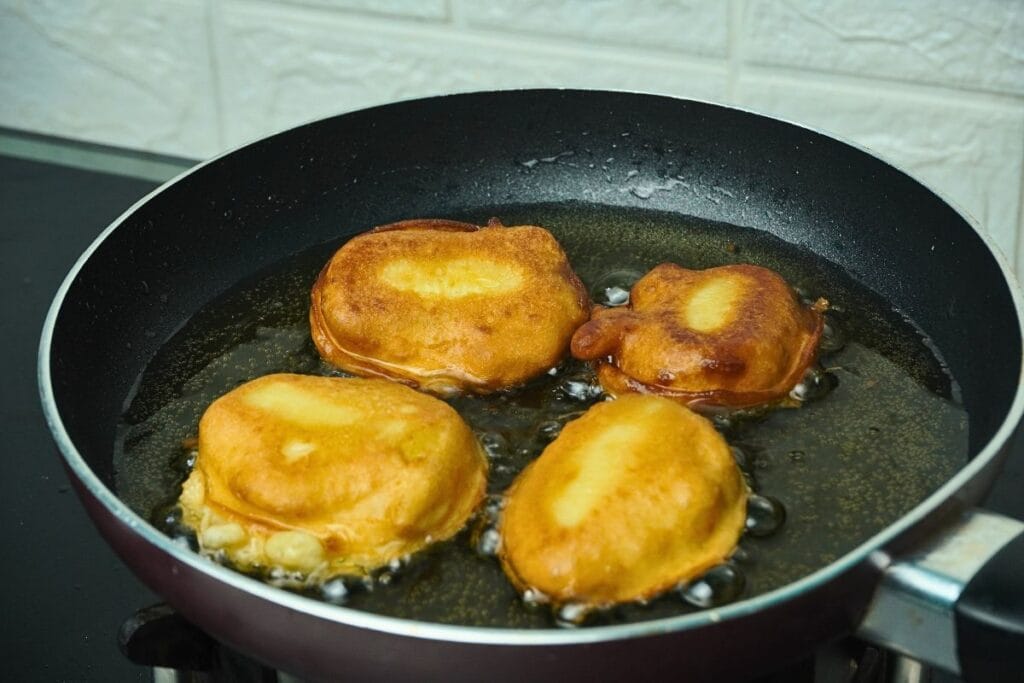 frying banana fritter