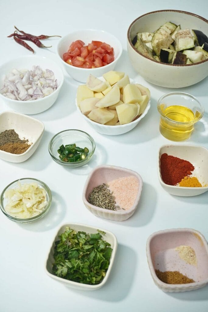ingredients for potato eggplant tomato - potato eggplant curry - eggplant potato curry - Indian potato eggplant recipe - vegan potato eggplant curry