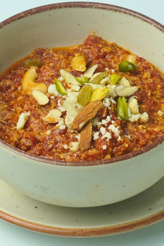 Carrot Pudding Gajar Ka Halwa garnishing with nuts