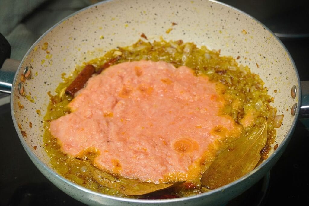 chickpea-curry adding tomato paste