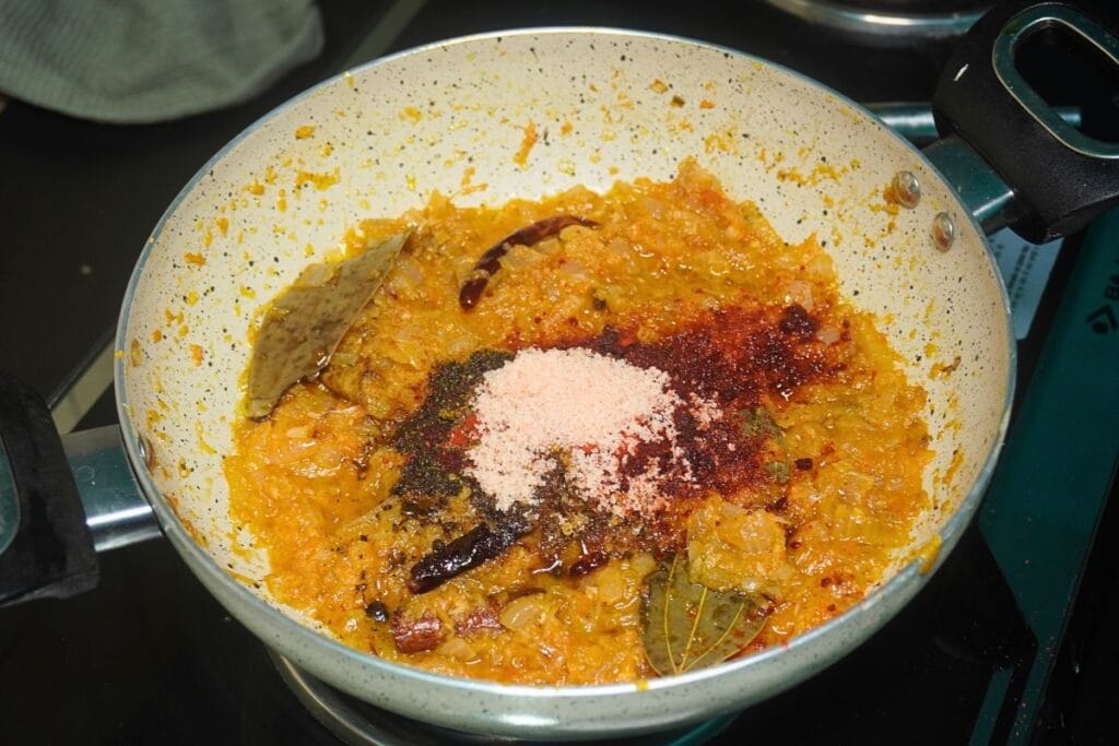 chickpea-curry adding whole spices powder