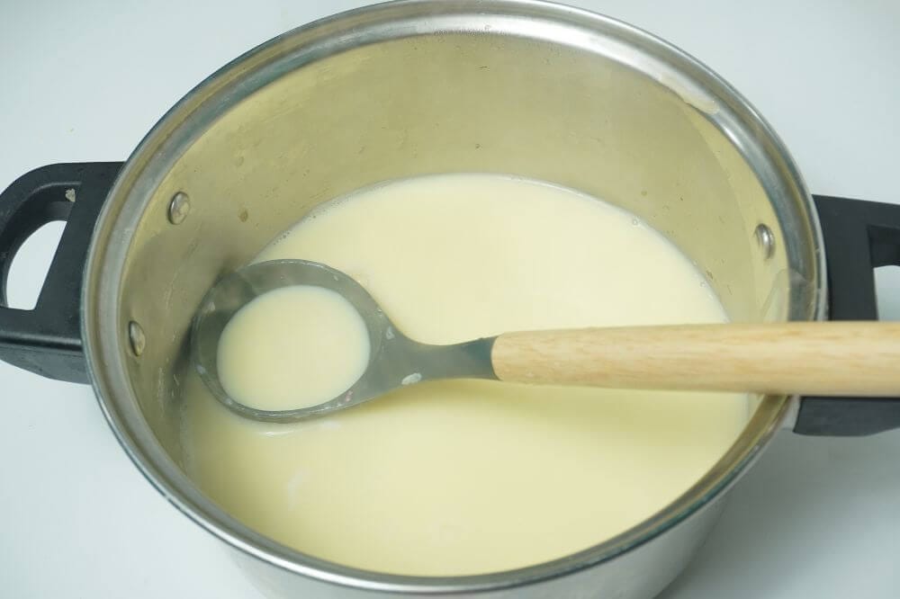 custard jelly add custard slurry to and milk in pot