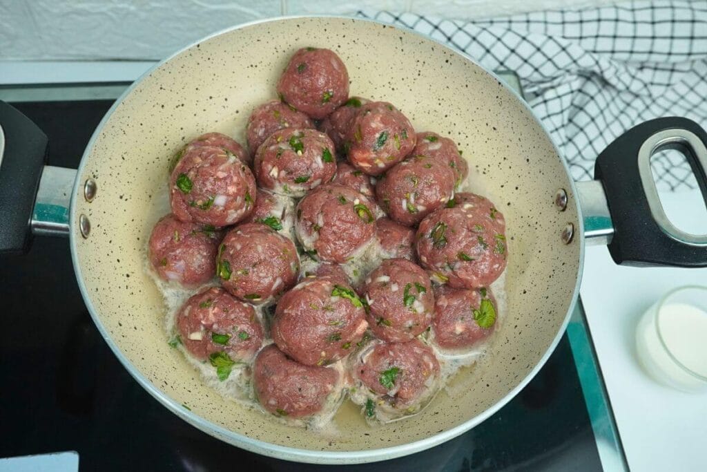 ground beef meatballs boiling