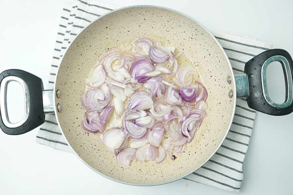 chicken liver and gizzard add oil and sliced onion