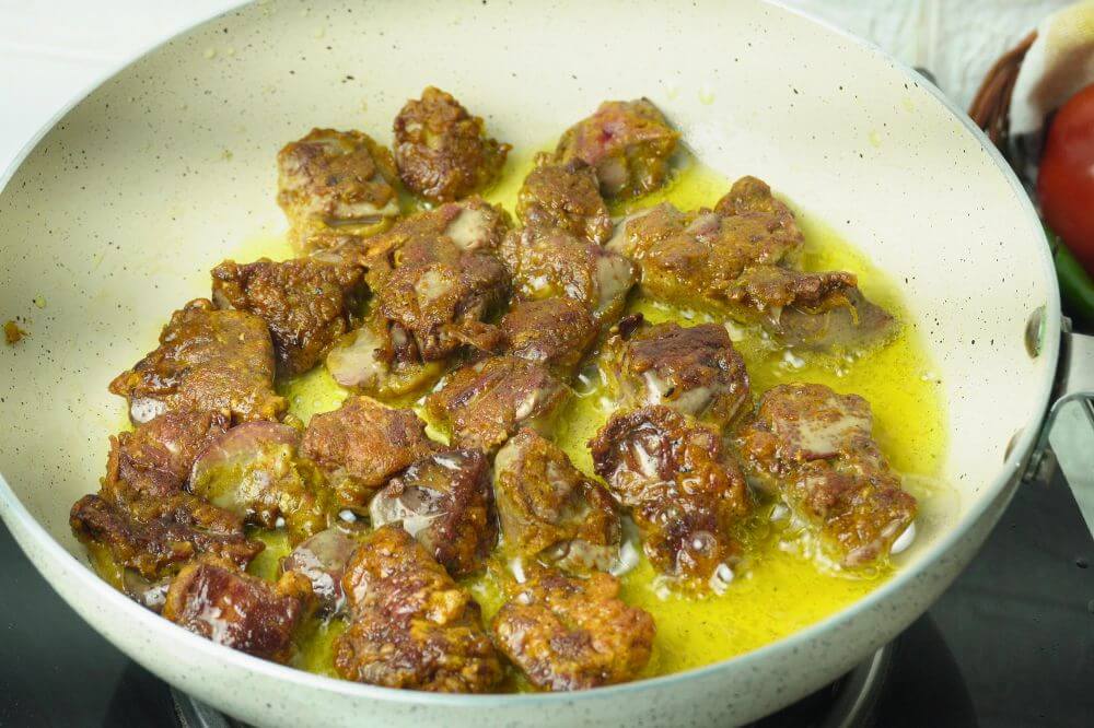 chicken liver fritters add in frypan