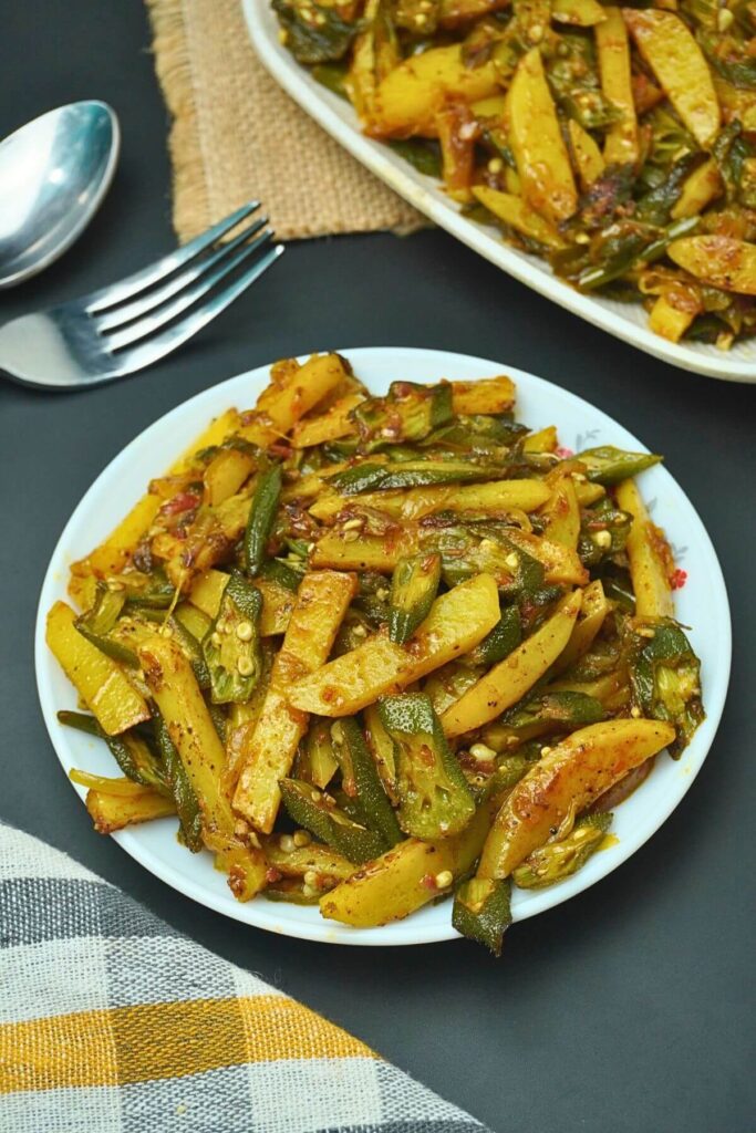 okra and potato stir fry serving in plate