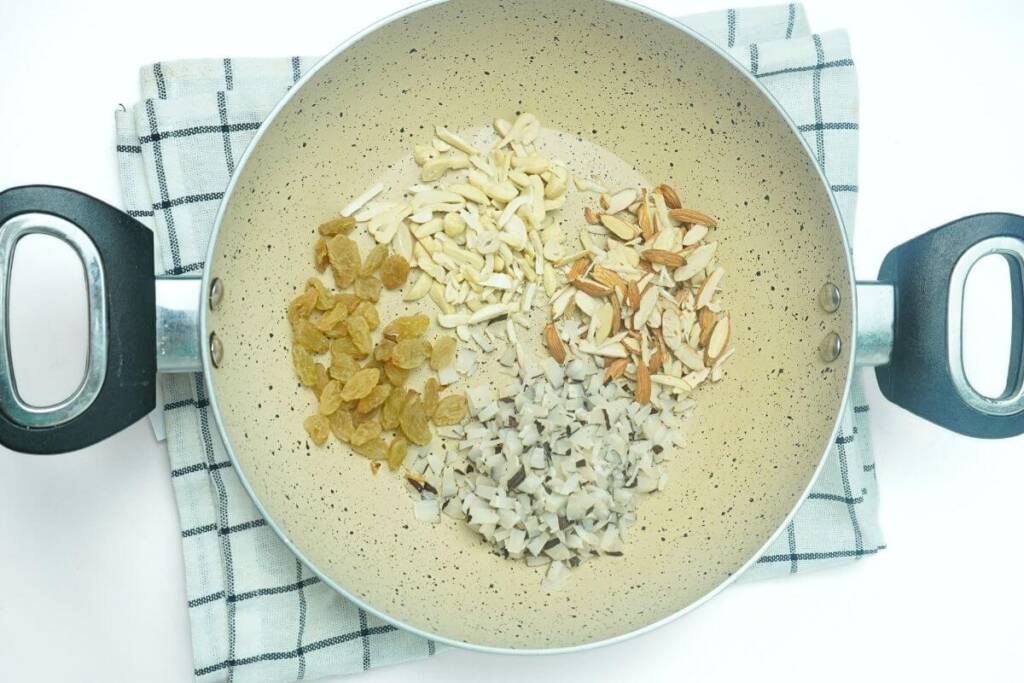 sweet vermicelli pudding kimami sewai add nuts in frypan