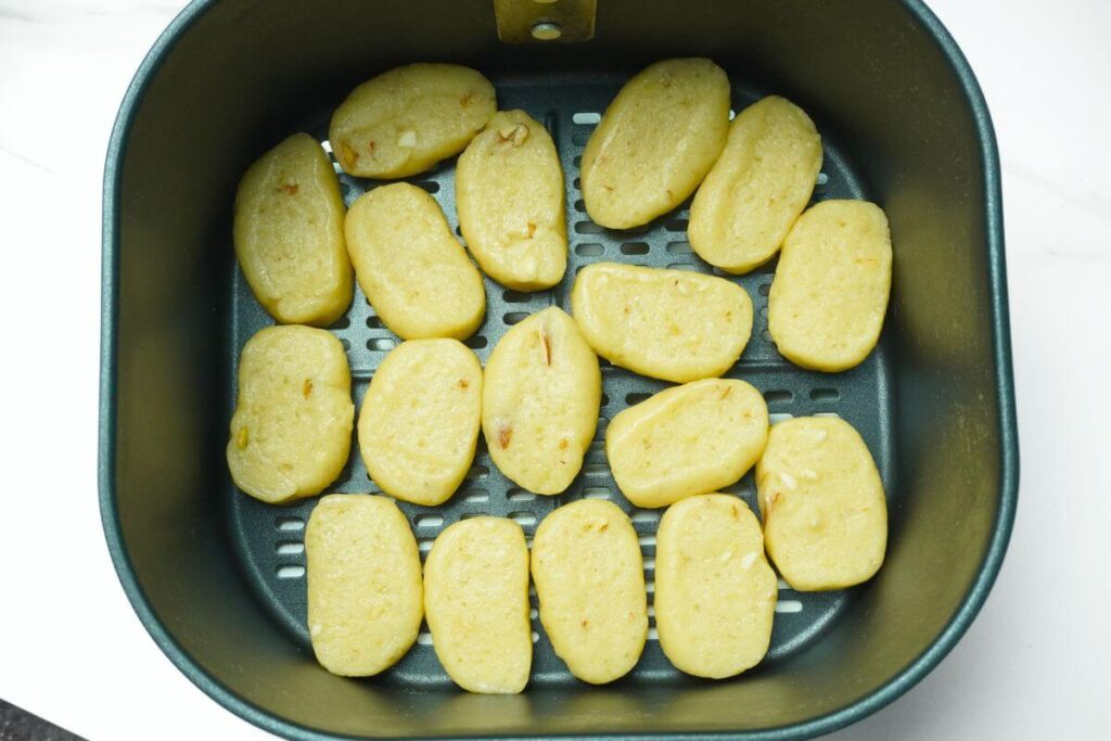 Air Fryer Khasta add pices in air fryer basket