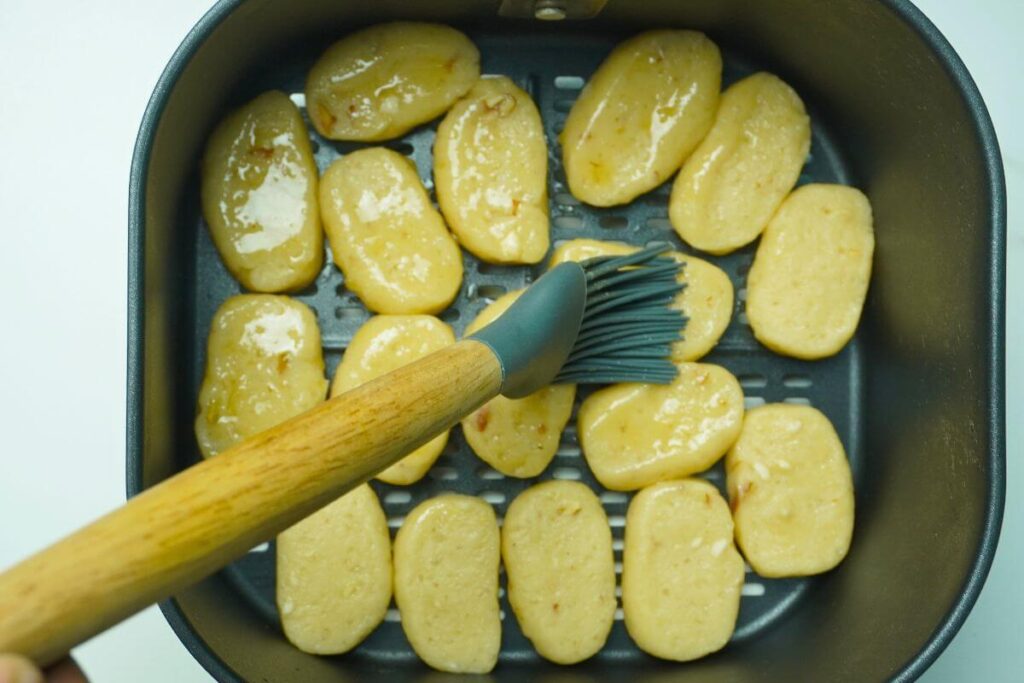Air Fryer Khasta brushing with oil