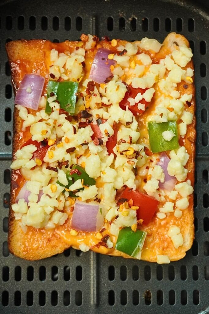 cheesy air fryer pizza toast add in basket