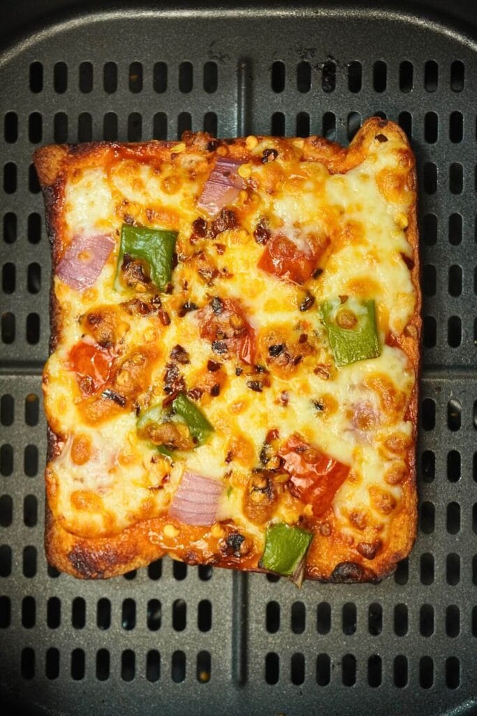 cheesy air fryer pizza toast cooked